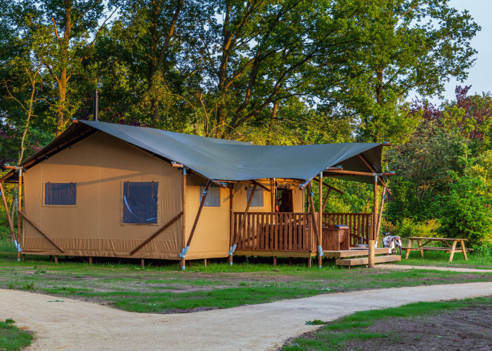 Lodge protected by a SUBRENAT outdoor fabric cover designed for collective accommodation structure