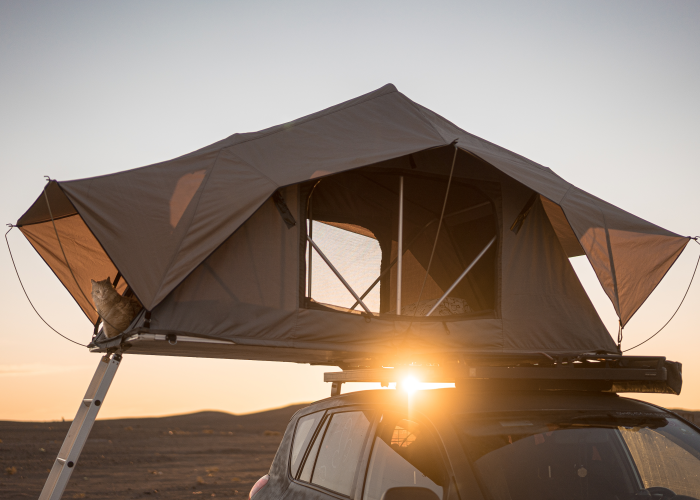 Folding caravan designed in a SUBRENAT outdoor fabric designed to create strong, comfortable and transportable folding tents